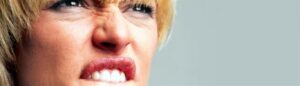 An adult’s obscene gesture