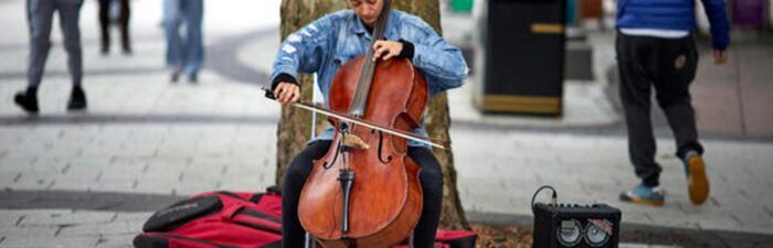 Being a busker refuels her cello passion